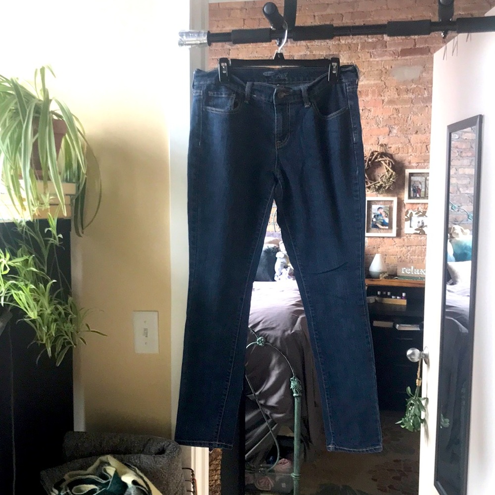 Flirty boot cut blue jeans dark wash